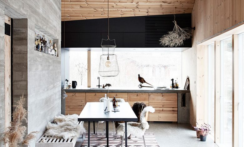 Фото - Дерево, бетон и чёрный цвет: уютный коттедж для тёплых снежных вечером